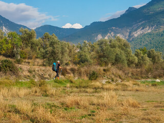 Obraz premium A man hiking in autumn, Organya, Lleida, Spain