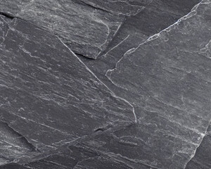 Natural black slate stone background pattern with high-resolution