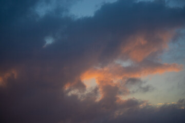 Naklejka na ściany i meble Beautiful cloudscape over the sunrise light.