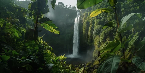 Keuken spatwand met foto a majestic waterfall crashing down into a jungle pool, surrounded by lush vegetation and mist rising into the air © Asif Ali 217