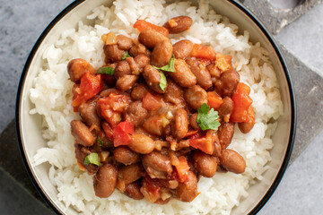Vegan bean curry with rice and tomatoes. Indian cuisine. Vegetarian dish. 