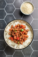Vegan bean curry with rice and tomatoes. Indian cuisine. Vegetarian dish. 