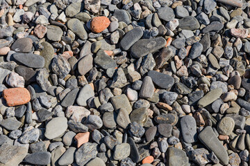 Texture of stones of gray and orange colors