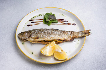 Delicious fish dish in the restaurant. Close-up