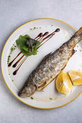 Delicious fish dish in the restaurant. Close-up