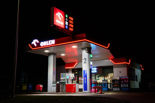 Orlen gas station for refueling car and cafe at night