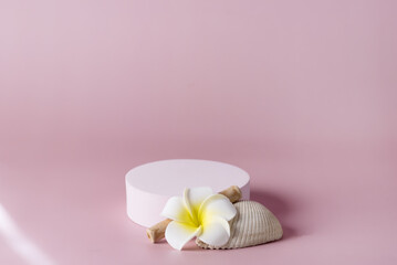 White podium with t flowers on pink background, spring tropical concept display for products cosmetics and perfumery horizontal