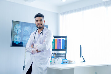 Healthcare, Medical Hospital Portrait: Healthcare and medical concept. Medicine muslim doctor with a stethoscope in hand and Patients come to the hospital background.