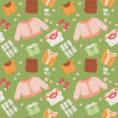 Seamless pattern featuring a variety of child clothing items.