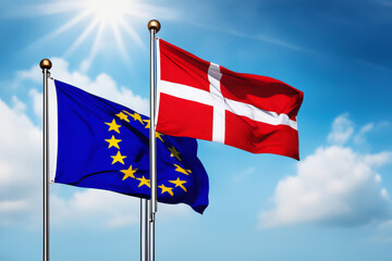 EU und Dänische Flagge vor blauem Himmel im Wind als Hintergrund