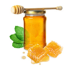 Natural honey in, pieces of honeycomb, mint leaves and wooden dipper on white background