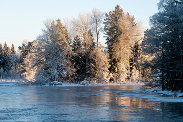 River landscape with frost and snow in a cold morning. Farnebofjarden national park in north of Sweden. - 745790331