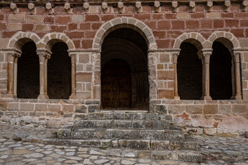gallery eaves with ship's bow corbels, Romanesque church of Jodra del Pinar, San Juan Bautista ,  Guadalajara, Spain