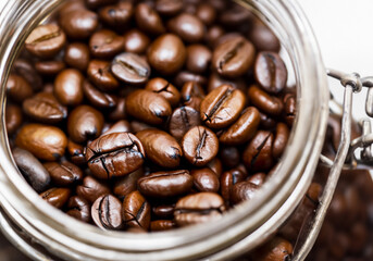 coffee beans in a glass jar..