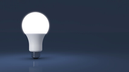 light bulb on dark background with copy space
