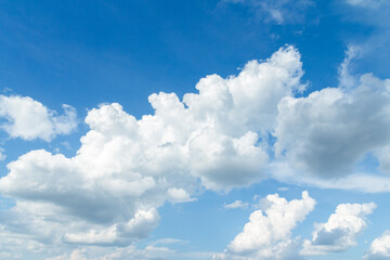 Naklejka na ściany i meble Blue sky background with tiny clouds. Nature abstract background for your design