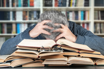 An adult tired of hard study lies over many books and dreams of mathematical formulas. The concept of learning difficulty in old age.