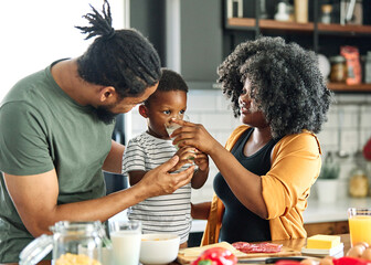 Fototapeta na wymiar child family kitchen boy son mother father drink breakfast milk healthy drinking food eating glass home black african american father man together love cute childhood
