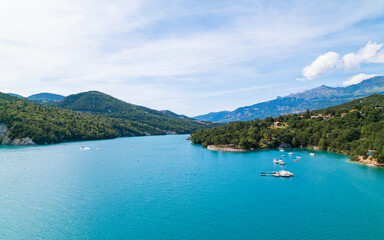 Aerial photo by drone of the Chanteloube bridge drowned in the turquoise waters of the Serre-Pon&ccedil;on lake, located in the Hautes-Alpes, in France