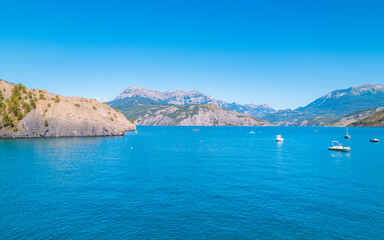 Aerial photo by drone of the Chanteloube bridge drowned in the turquoise waters of the...
