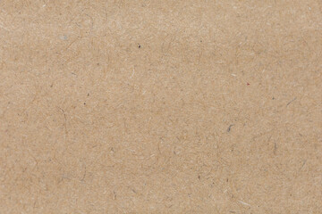Close up of Old brown paper texture  visible. Paper fibers suitable for use as background images or decorations