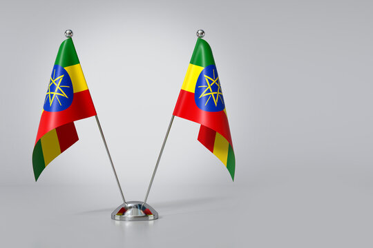 Double ederal Democratic Republic of Ethiopia Table Flag on Gray Background. 3d Rendering
