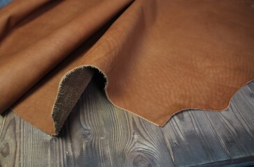 Natural leather texture surface of cognac color