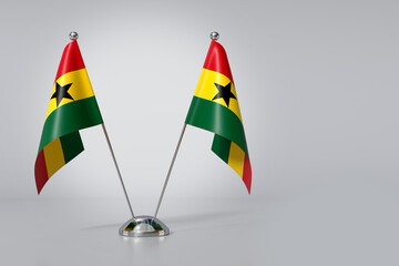 Double Republic of Ghana Table Flag on Gray Background. 3d Rendering - obrazy, fototapety, plakaty
