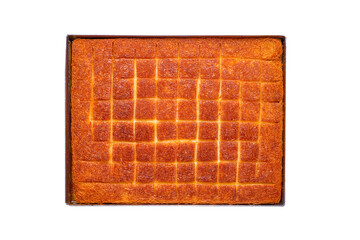 a tray of Turkish baklava sweets, isolated on a white background