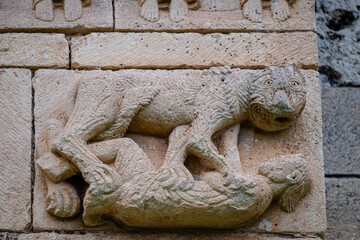 lion attacking a man, hermitage of San Pedro de Tejada, Romanesque hermitage, Puente-Arenas, the...
