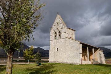 Fototapeta na wymiar Parish Romanesque temple dedicated to the Assumption of the Virgin, Pisón de Castrejón, Palencia, Spain