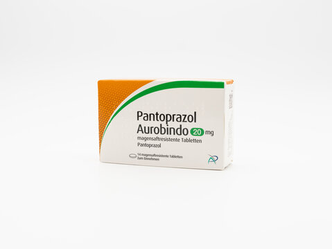 DRESDEN, GERMANY - 22. February 2024: Pantoprazol Aurobindo tablets from PUREN Pharma in a package isolated on white. Medication against heartburn.