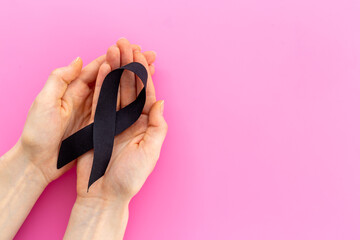 Fototapeta premium Mourning black ribbon. symbol of mourning and tragedy