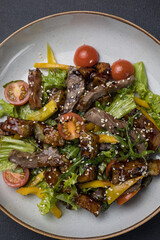 A delicious salad in a restaurant. Close up