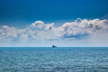 Sea landscape and ship on horizon