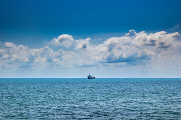 Obraz premium Sea landscape and ship on horizon