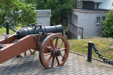 Pattern of grey wall surface, made of artificial stone of different sizes