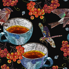 Embroidery cup of tea, birds, dragonflies and mountain ash berries. Fall garden template of clothes, tapestry, t-shirt design. Autumn seamless pattern - 745838959