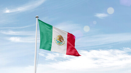 Mexico national flag cloth fabric waving on the sky.