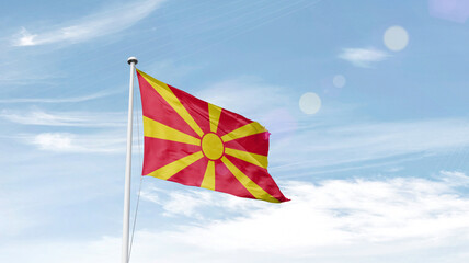 North Macedonia national flag cloth fabric waving on the sky.