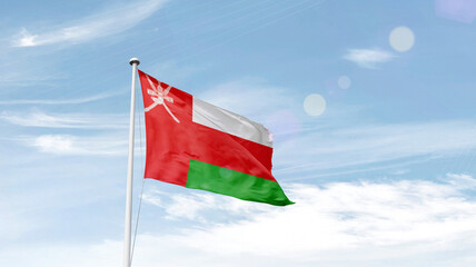 Oman national flag cloth fabric waving on the sky.