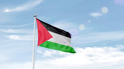 Palestine national flag cloth fabric waving on the sky.