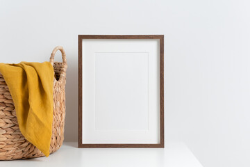 Wooden poster frame mockup with copy space in scandinavian style interior