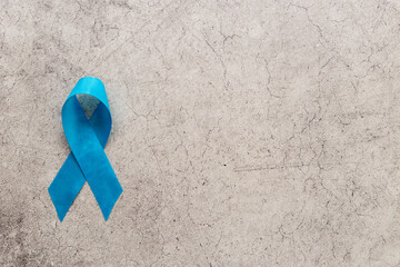 Blue ribbon - colon or prostate cancer awareness concept