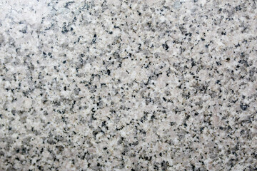 Granite texture background. Close up of natural stone surface.