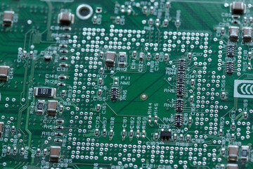 Obraz premium Part of motherboard or electronic board from computer processor with abundance of tiny details prepared for repairing work
