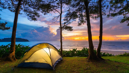 Camping on the lake beach in the forest, at the sunset.	

