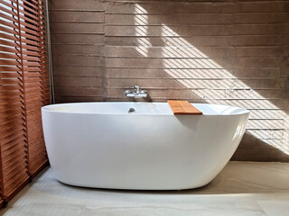 The bathtub in the bathroom of the beach resort, for relaxing on holiday.