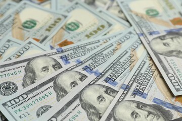 Money exchange. Dollar banknotes as background, closeup