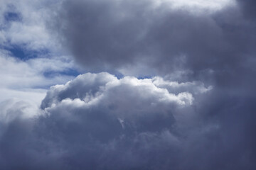 Large rain clouds in the sky close-up, sky before the rain, the arrival of a storm